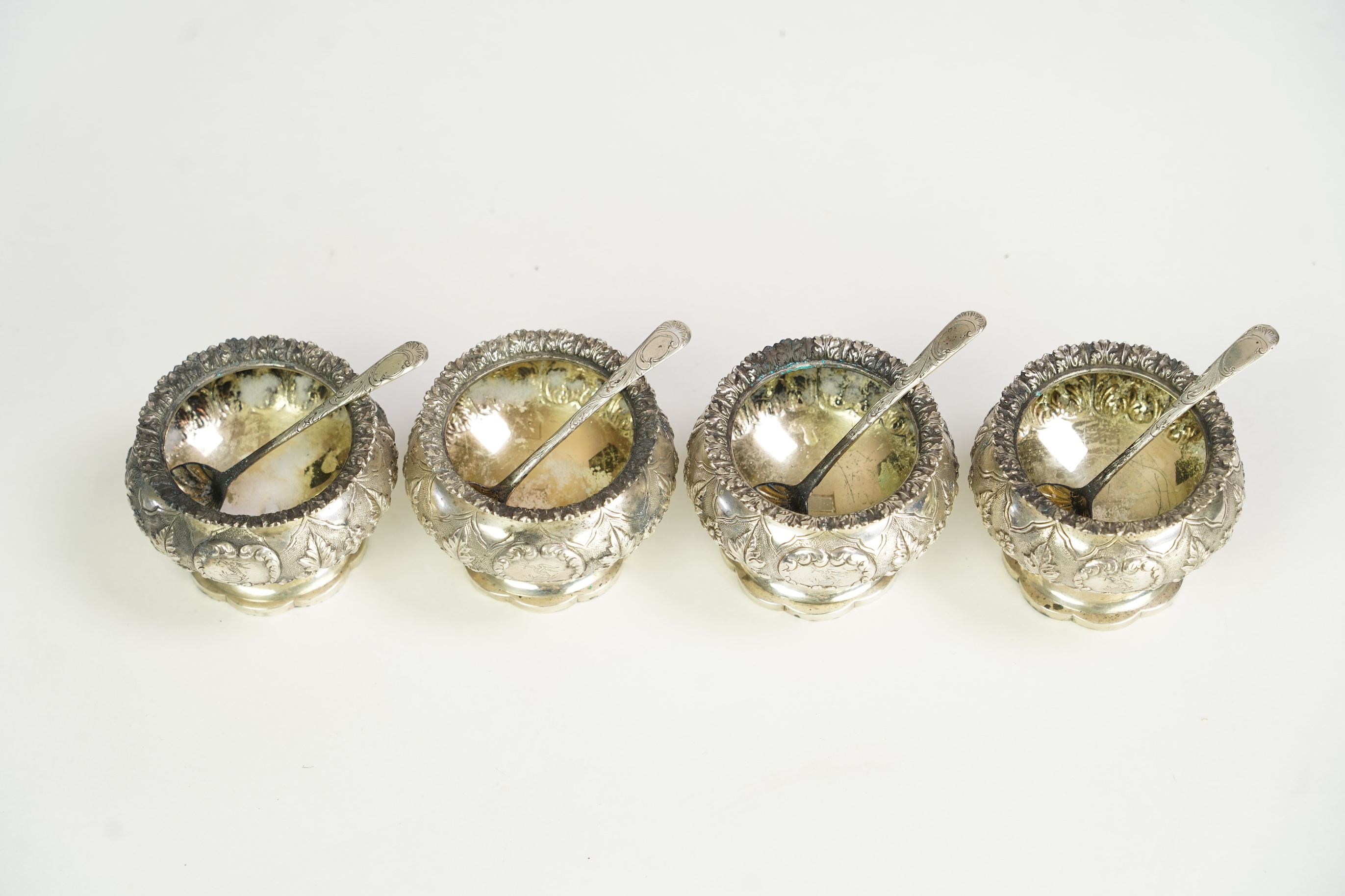 A set of four George IV silver circular pedestal salts by Richard Pearce & George Burrows